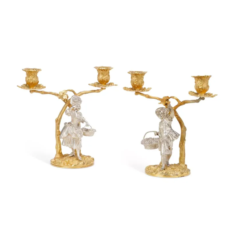 A Pair of Elizabeth II Silver and Silver-Gilt Two-Branch Figural Candelabra by C