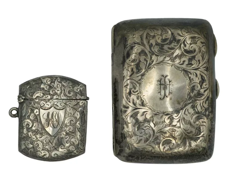 A silver vesta case and a silver cigarette case
