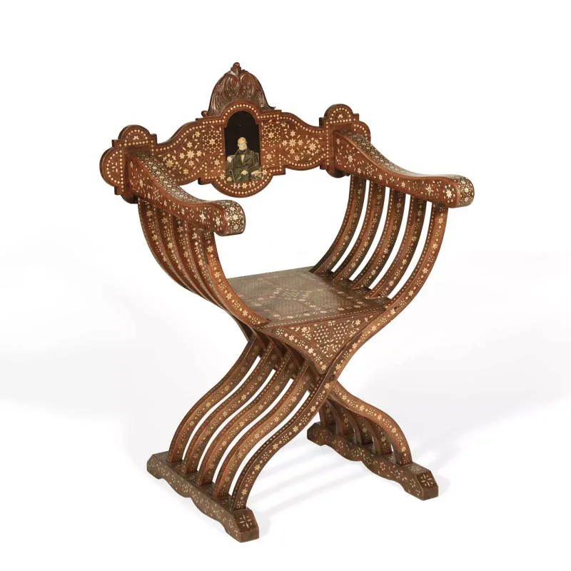 A Bone Inlaid X-Frame Chair 19th Century, of Savonarola form and inlaid throughout with stars and flowerheads
