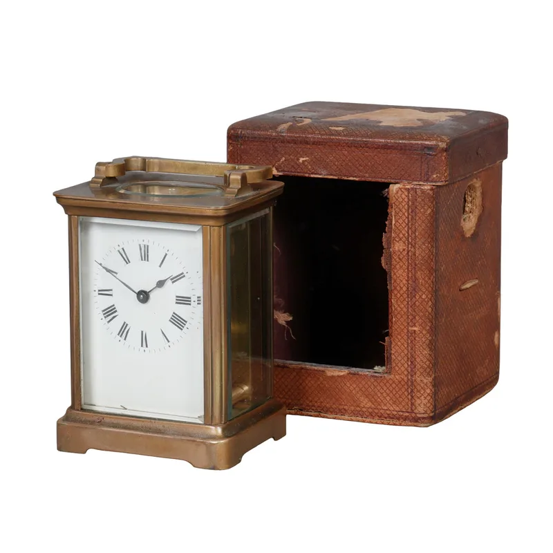 A 19th Century French Brass Cased Carriage Clock with Leather Travelling Case