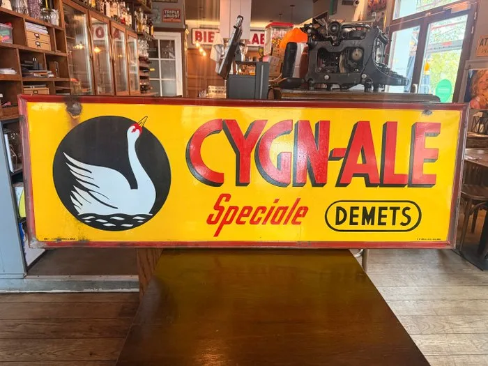 Emaillerie Koekelberg - CYGN-ALE Special – DEMETS – Large enamelled Belgian advertising plaque – 1954 – 137 × 47 cm - Enamel plate - Enamel