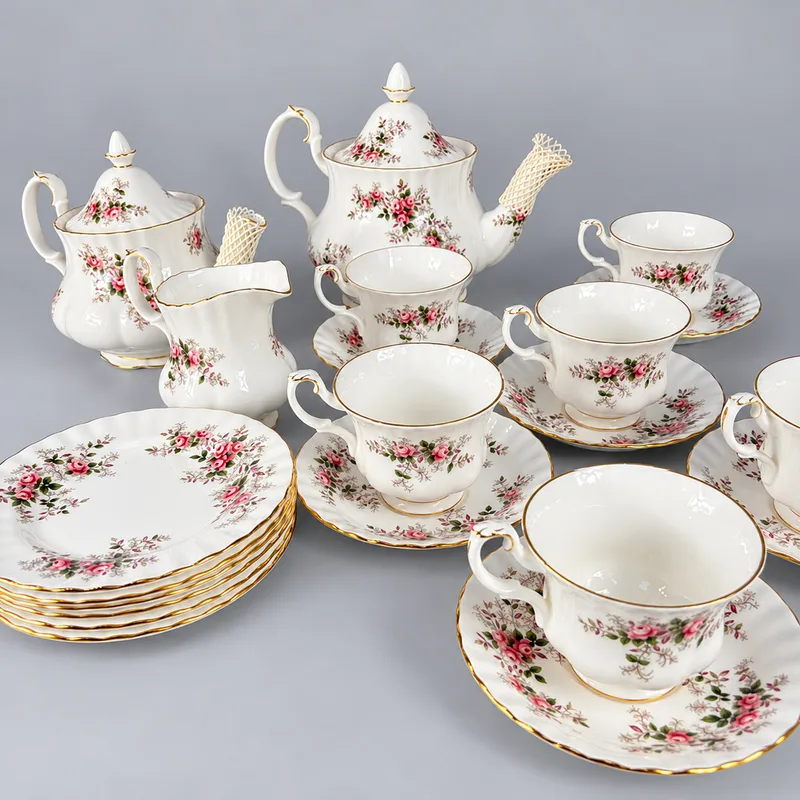 Royal Albert 'Lavender Rose' tea set, six cups, saucers, plates, two teapots, milk jug