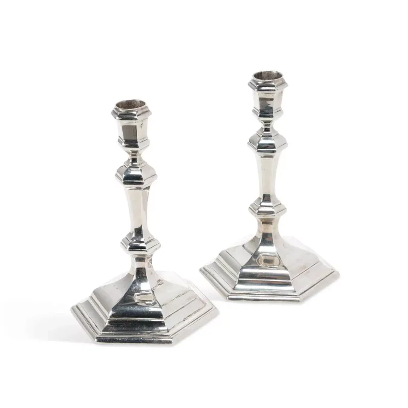 A Pair Of George I Silver Candlesticks makers mark Lii (possibly Seth Lofthouse), London 1718, with lion's head erased mark
