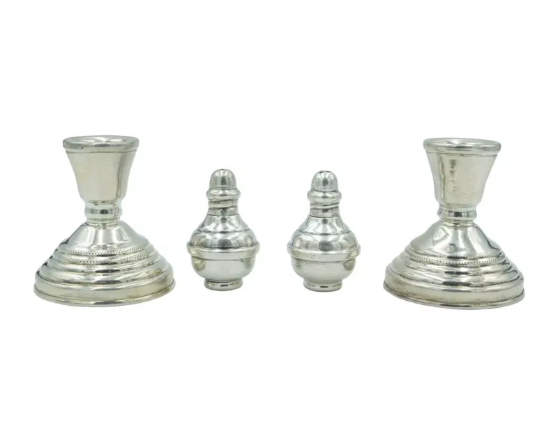 A set of two Egyptian 900 silver squat candlesticks
