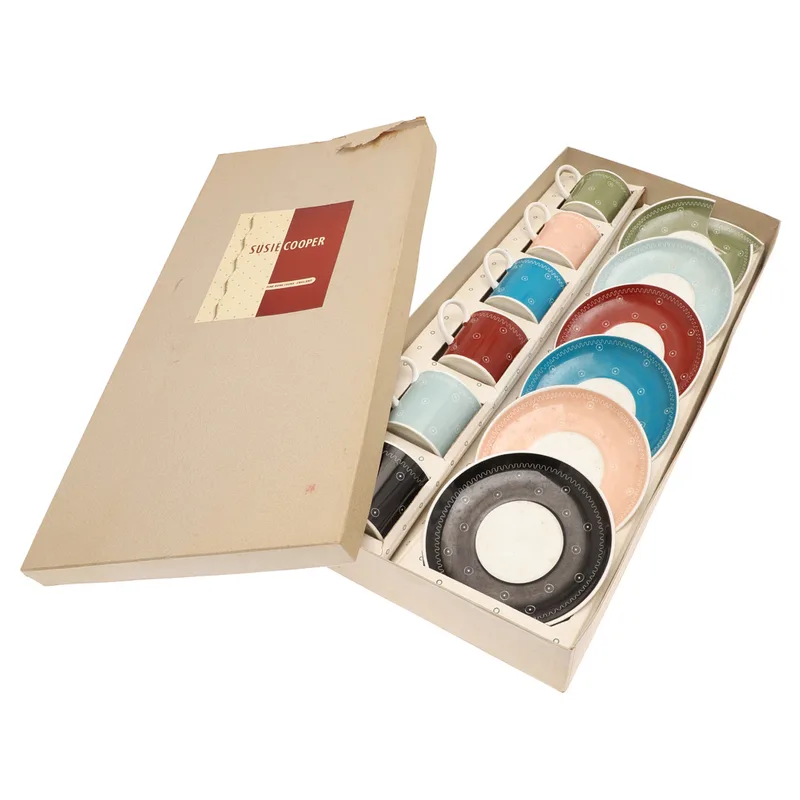 Susie Cooper. a Cased Set of Six Coffee Cans & Saucers
