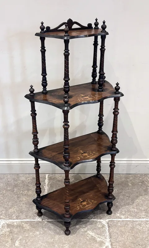 A Victorian walnut and marquetry inlaid etagere, with four shelves, on turned supports,