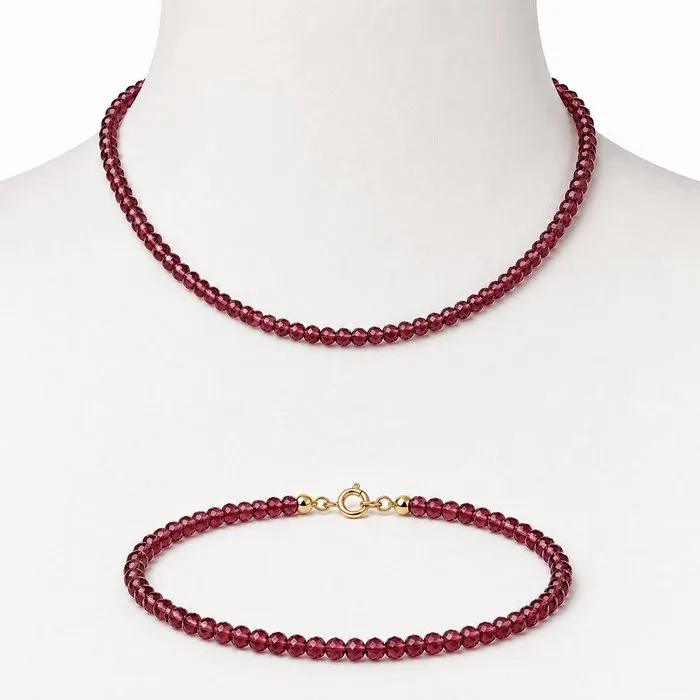 2 piece jewellery set - 18 kt. Yellow gold Garnet