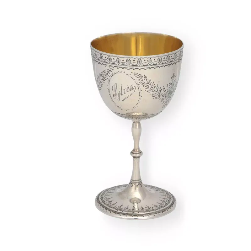 A Victorian Silver Goblet by Thomas Smily, London 1867, of typical form, the bowl engraved with foliate swags, the interior gilt