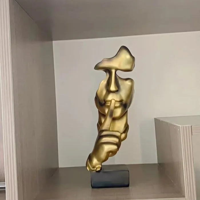 Figurine - Silence is golden. - Resin