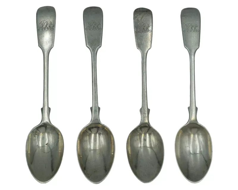 A set of four Victorian silver fiddle-pattern teaspoons by John Aldwinckle & Thomas Slater