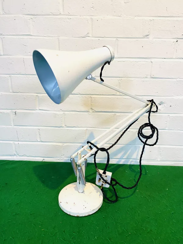 A vintage mid century Herbert Terry anglepoise table lamp with a weighted circular base, fully marked. 15.75cms base diameter x 93cms maximum height