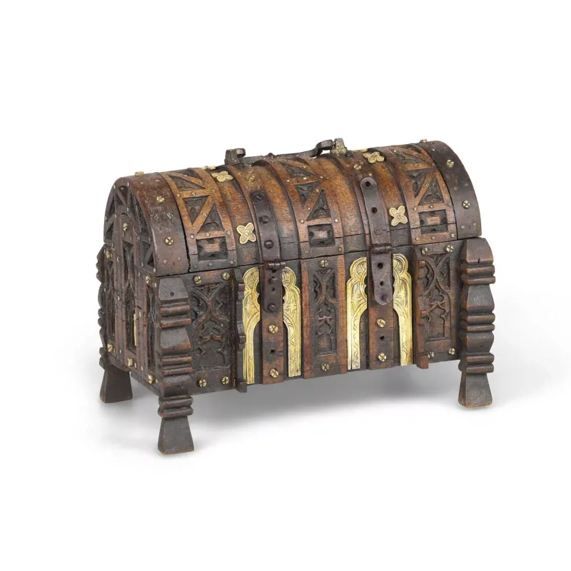 An Oak And Bone Mounted Casket in the Gothic taste, of rectangular form with a domed cover, the oak carcase carved throughout with cusped arches