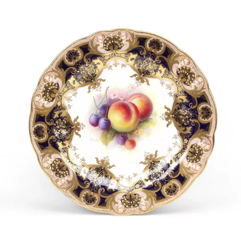 A Royal Worcester Cabinet Plate Painted By Albert Shuck dated 1924, of shaped circular form, painted to the centre with peaches