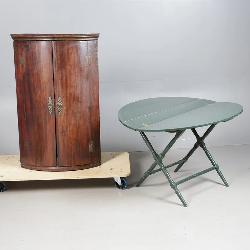 A George III Mahogany Hanging Corner Cupboard, Together with a Green Painted Coaching Table (2)