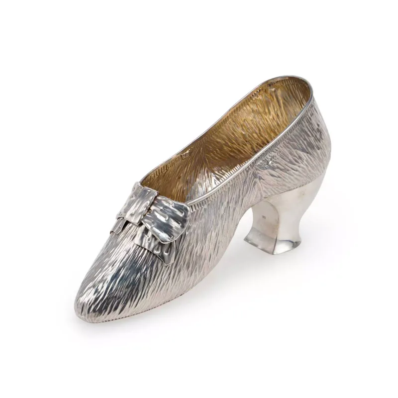A Late Victorian Silver Model Of A Shoe by George Nathan & Ridley Hayes, Birmingham 1890, realistically modelled and chased.