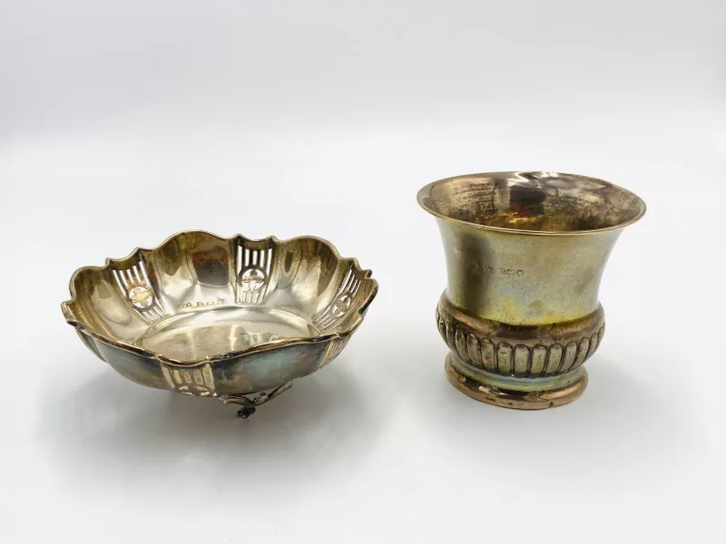 An early 20th century silver dish to three feet; together with a silver bowl
