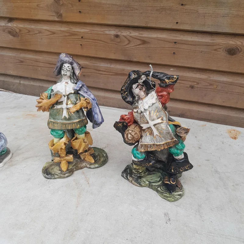 Pair of 20th century Cantagalli Three Musketeers ornaments note damage