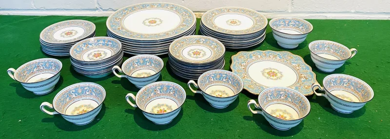 A Wedgwood turquoise 'Florentine' pattern part dinner and tea service, to include dinner plates, side plates, cake plate, cups & saucers, etc