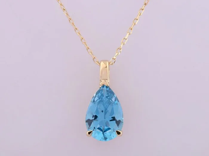Necklace with pendant - 14 kt. Yellow gold - 1.34ct. tw. Topaz