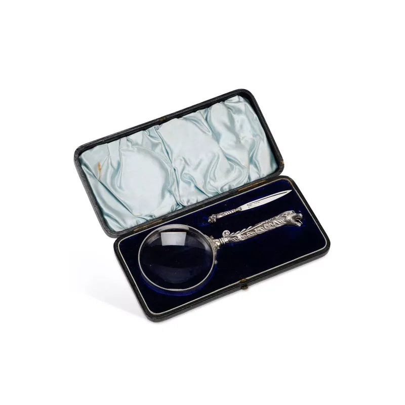 A Late Victorian Silver-Mounted Magnifying Glass And Silver Bookmark Set comprising the bookmark marked by Adie Lovekin, Birmingham 1898