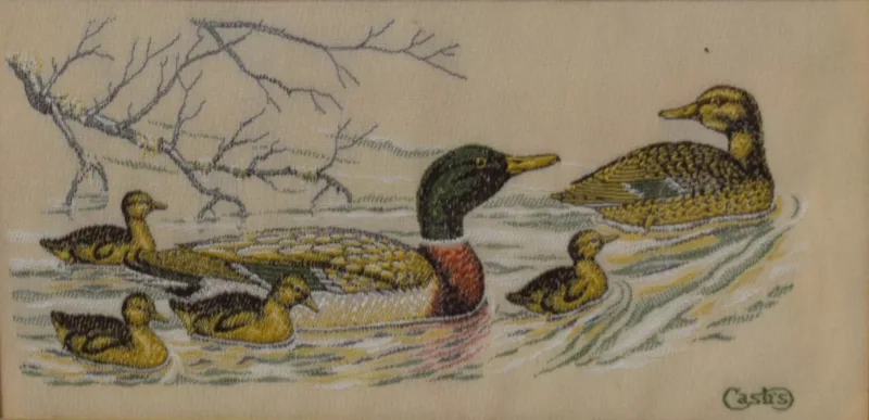 A collection of seven 'Cash's' embroideries, depicting various British wildlife, attributed lower right, within washline card mounts and moulded gilt frames