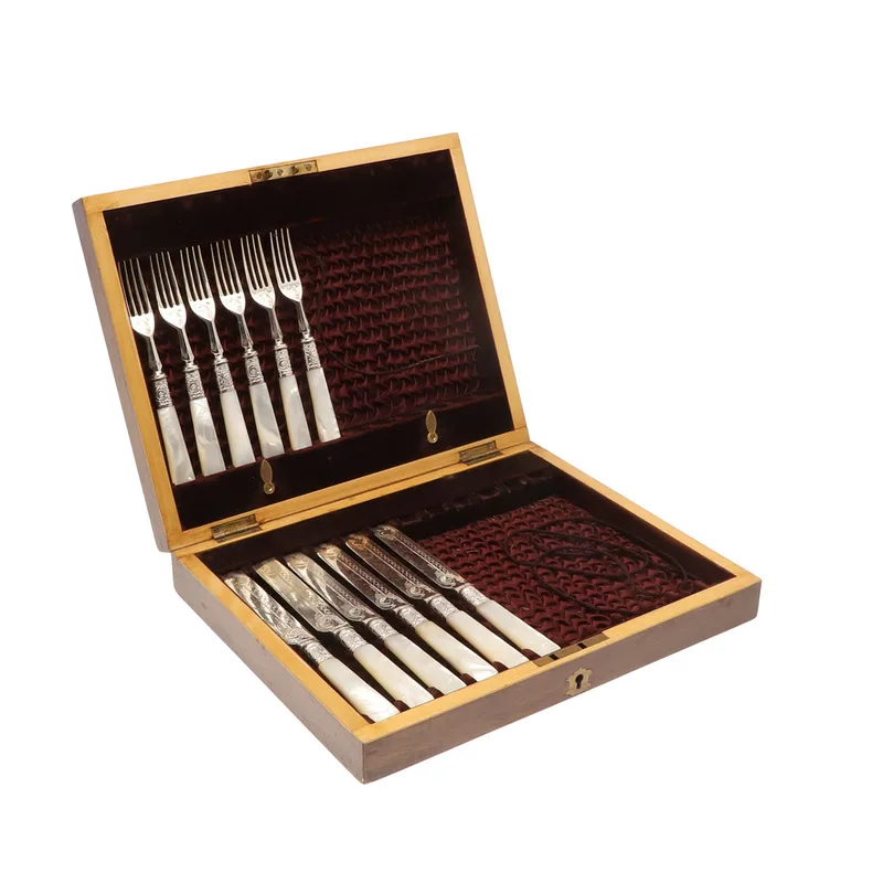 A Cased Part Set of Mother of Pearl Handled Fruit Knives and Forks