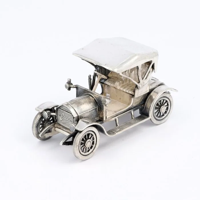 J. Niekerk. 1909 Opel Coupe. - Figurine -.835 silver