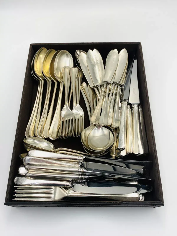A matched eight place part set of silver cutlery, comprising eight silver table spoons, (four Sheffield 1973, two Sheffield 1976, two Sheffield 1902), 646g