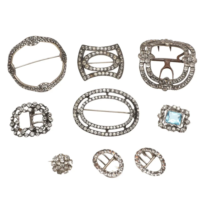Nine Paste Set Silver and Other Buckles and Brooches
