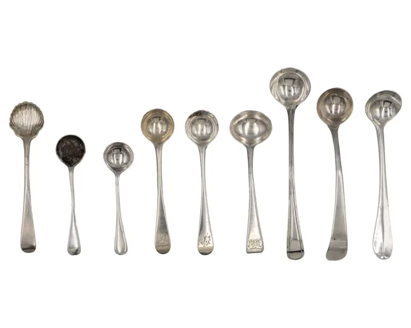 A selection of George III and later silver mustard spoons