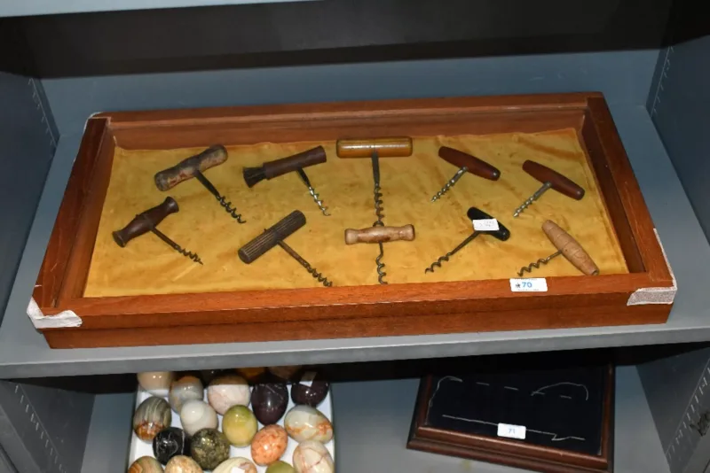 A collection of 19th-century wooden T-bar corkscrews, to feature rose wood, mahogany and ebonised wood examples, housed in a wooden collectors case