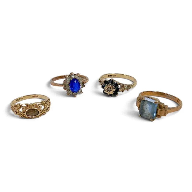 Four 9CT Gold Dress Rings