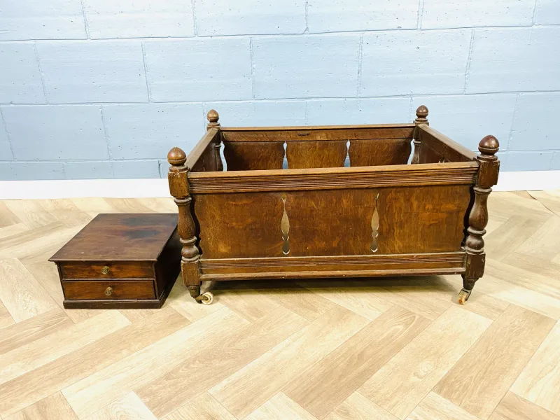 A large early 19th century oak open plan box; and an early 19th century mahogany table top chest