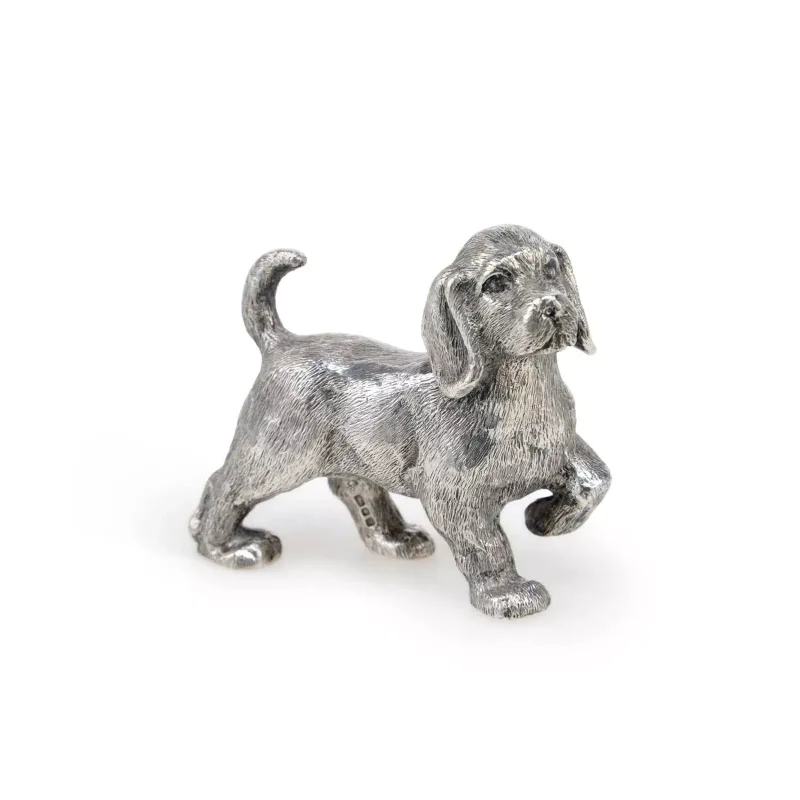 An Elizabeth II Silver Model Of A Beagle by Smd Castings, London 1973, realistically modelled in a standing pose with one raised paw
