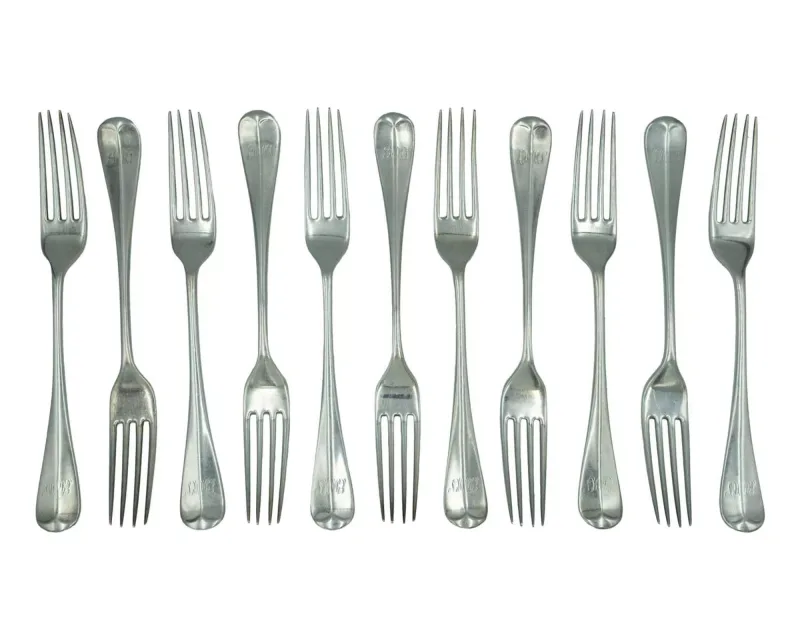 A set of eleven Victorian silver Hanoverian-pattern dinner forks by John Round & Son Ltd