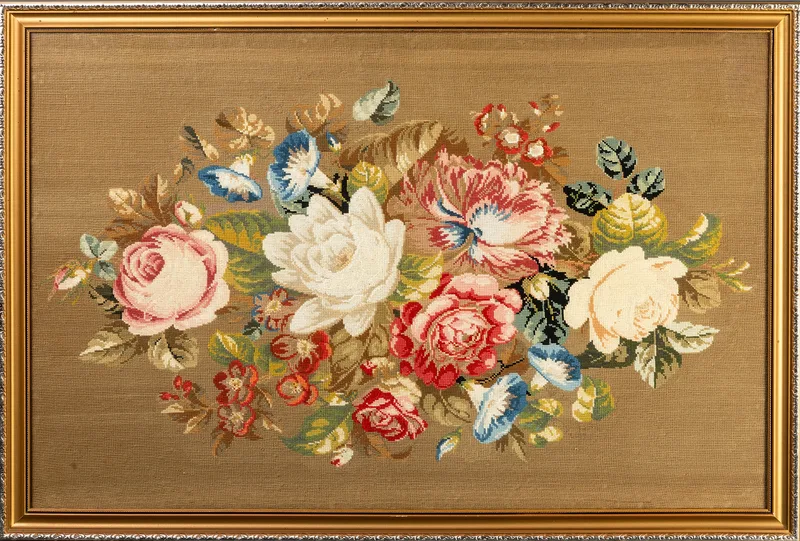 A 20th century woolwork panel, floral display on a sage green ground, in a gilt frame, glazed Image: