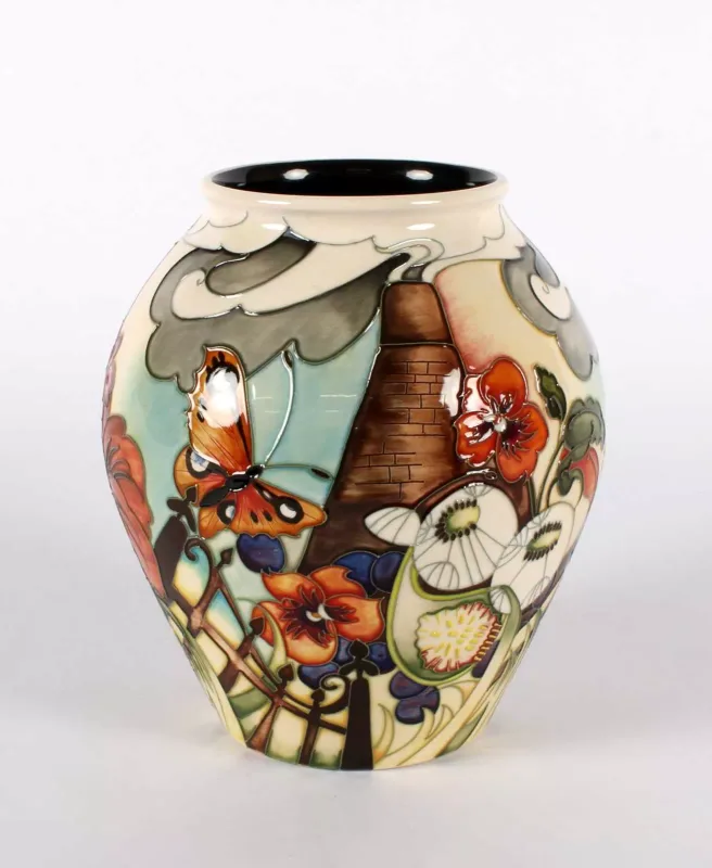 'Guardian Angel' Vase by Moorcroft 'Guardian Angel' Vase by Moorcroft, inverted baluster form, with tubeline decoration on cream background