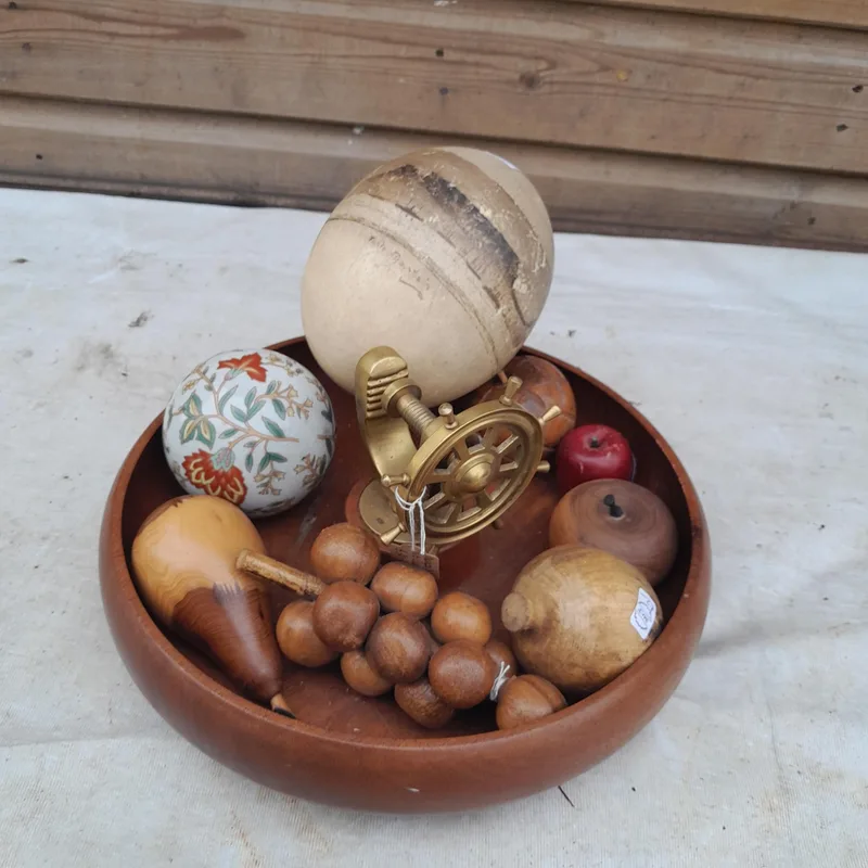Wooden centre piece nutcracker, painted vintage ostrich egg and other ornaments