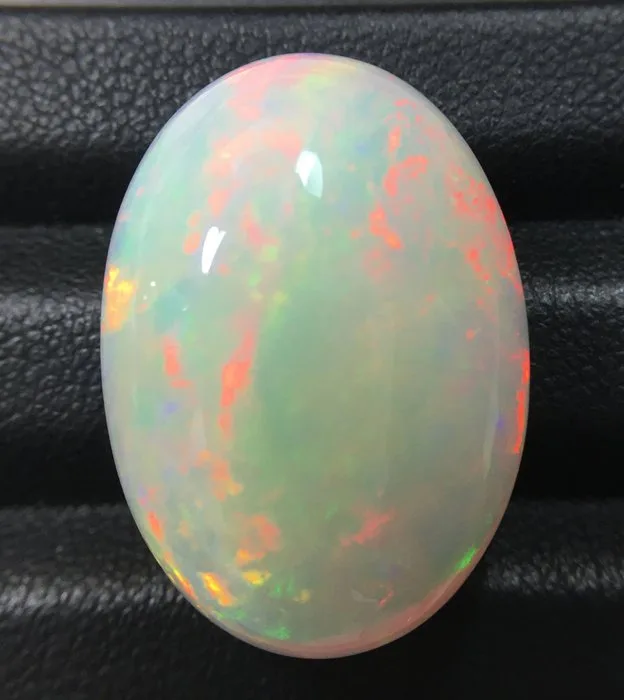 1 pcs Yellow, Orange Opal - 23.90 ct - International Gemological Institute (IGI) - NATURAL COLOR PLAY OPAL