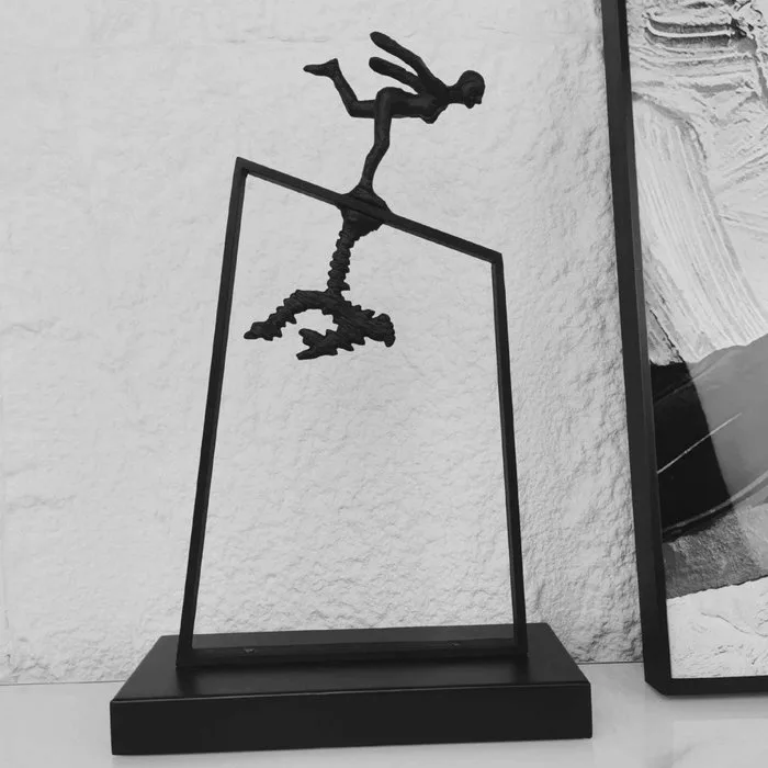 Sculpture, "On the Edge" — a black metal sculpture of a skater mounted on a tilted frame. - 38.5 cm - Alloy