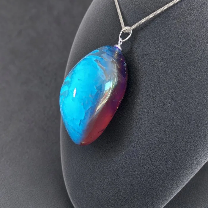 Sumatra amber pendant, XL size. Exceptional bi-color effect. Sterling silver 925 bail. Rare collectible piece. - Height: 5.2 cm - Width: 2.4 cm- 12.63 g