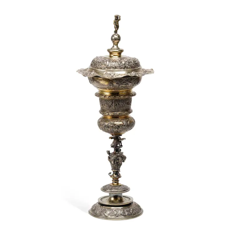 A Continental Silver And Silver-Gilt Standing Cup And Cover apparently unmarked, possibly German, 19th Century, of circular form with a fitted domed cover