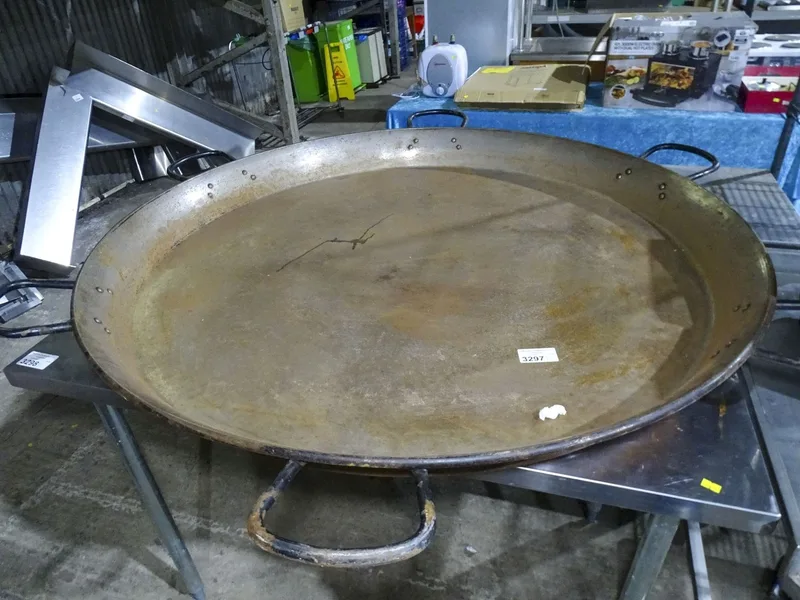 An extra large Paella pan with 6 handles, cooks for 200 people