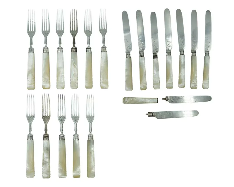 A part set of William IV mother-of-pearl handled cutlery by Aaron Hatfield & Sons