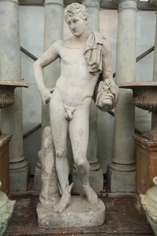 A copy of the Farnese Hermes The life-sized sculpture in resin with a paint finish