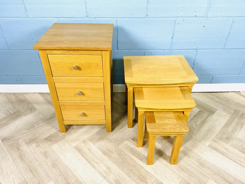 Two items to include a small good quality contemporary solid oak chest of three drawers with silvered metal handles (44cms wide x 43.5cms deep x 74cms high)