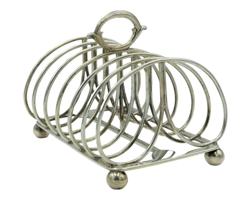 A large George IV silver toast rack by William Stroud
