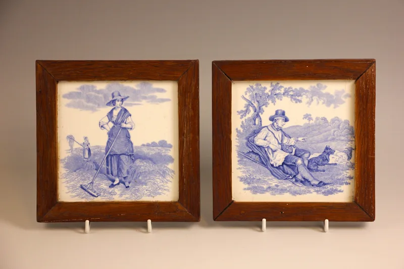 A pair of blue and white tiles by William Wise (1847-1889) for Minton, late 19th century, one depicting a resting shepherd and his flock