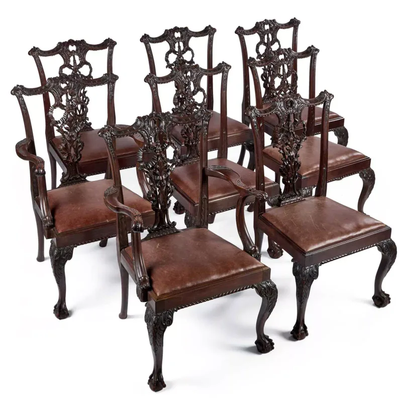 A Set Of Eight Victorian Mahogany Dining Chairs In The Chippendale Taste including a pair of carvers, each with a ribbon-tied splat