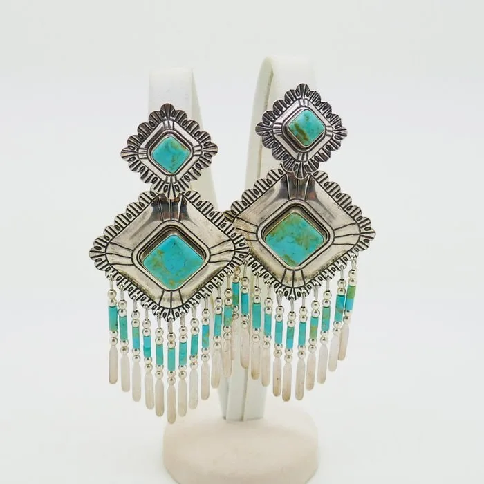 Silver earrings with turquoise. - Navajo - U.S